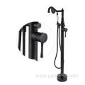 Freestanding bathtub faucet with hand-held spray